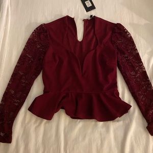 Fashion nova deep V shirt, needs a button in the back but it’s a quick fix